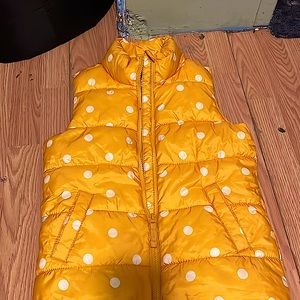 It’s a large 10 to 12 for kids it’s yellow and white and it’s from Old Navy